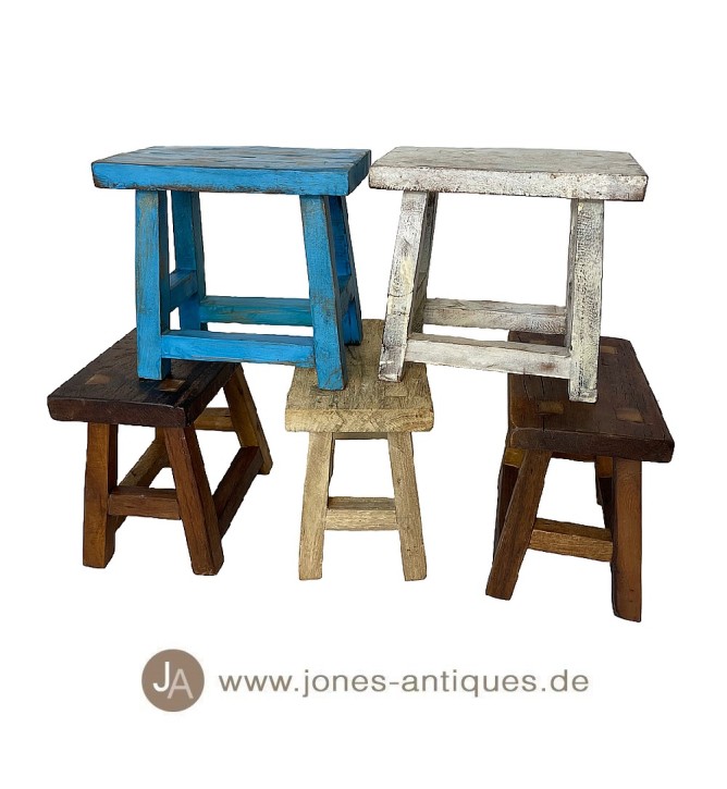 Small stools made of mango wood in various colors