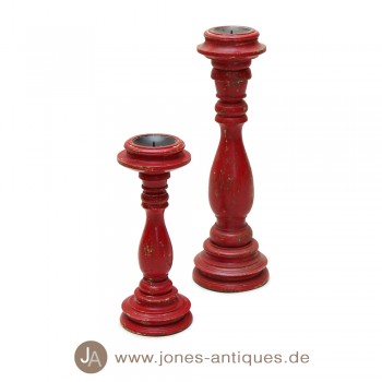 Small candle holder made of wood in a beautiful antique finish in the color red-antique