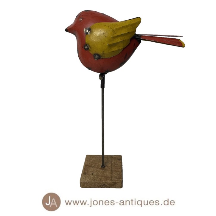 Vogel aus Eisen auf einem Holzständer - handgearbeitet