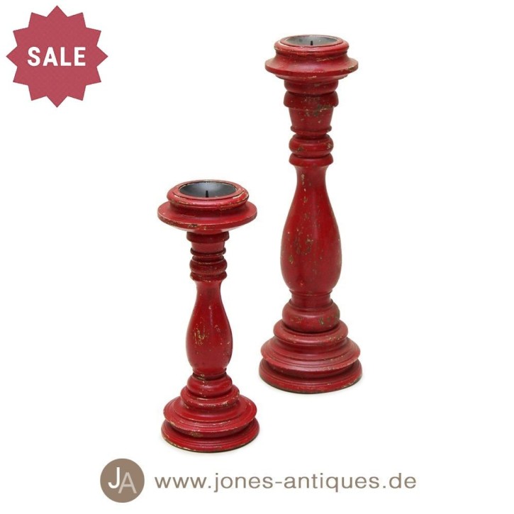 Large wooden candle holder in a beautiful antique finish in the color red-antique