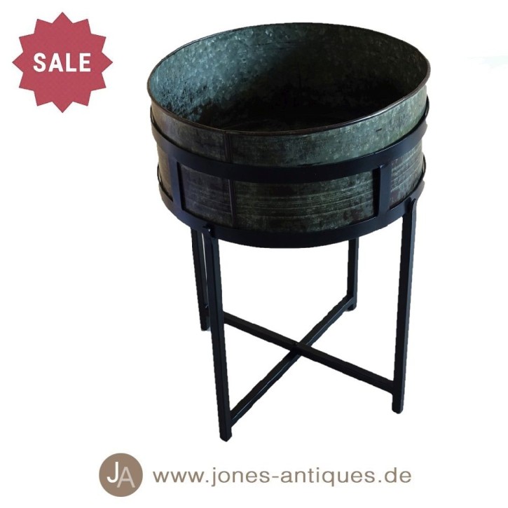 iron vessel on folding stand